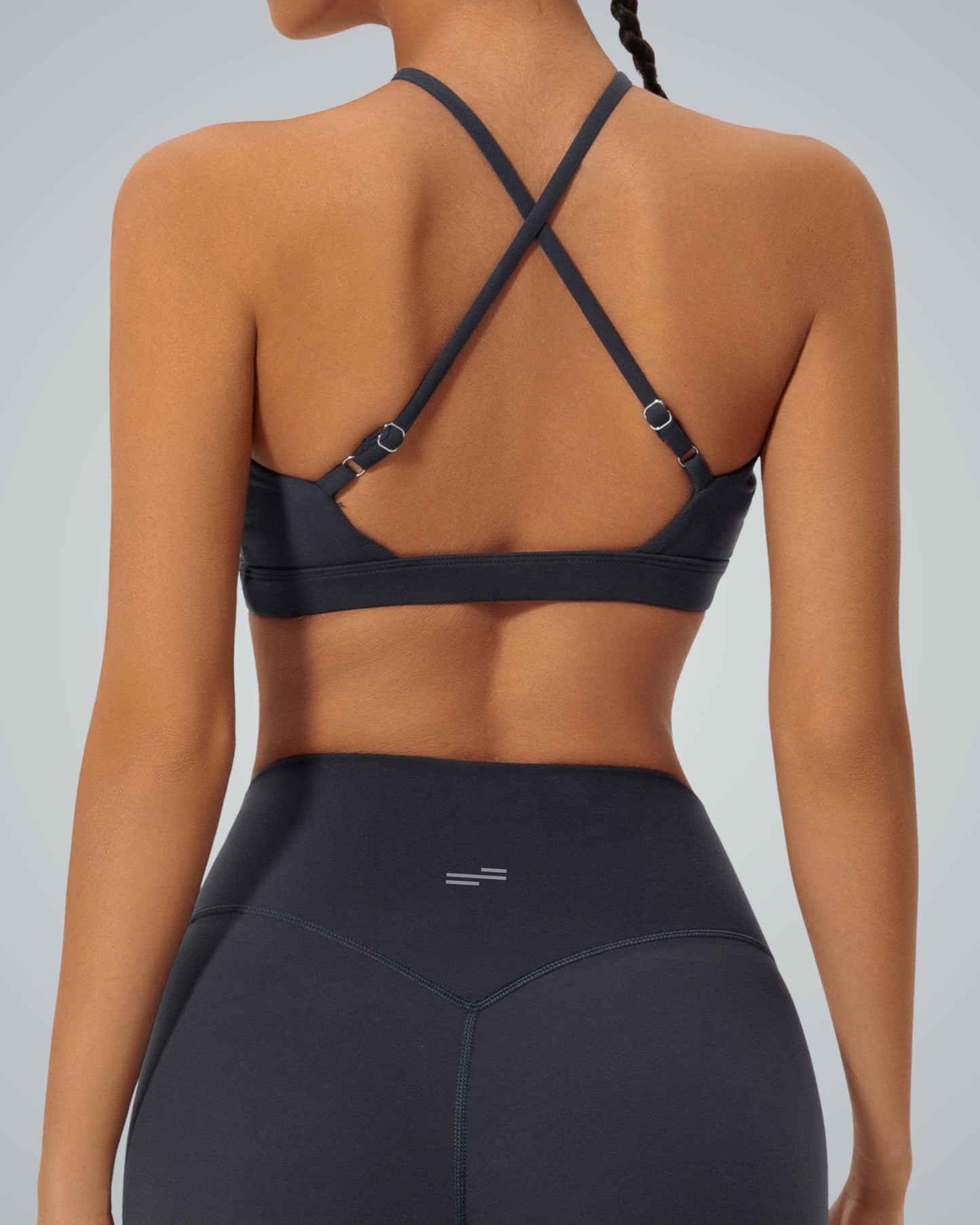 Back view of woman wearing Bandsam ShapeSync Bra with crisscross design, perfect for comfort, yoga, workout, and flexible activewear.