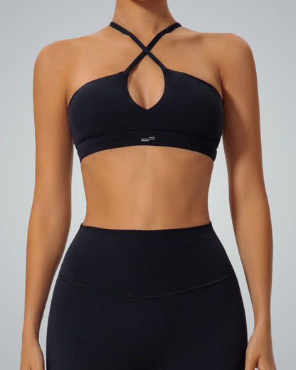 Bandsam ShapeSync Bra in black featuring crisscross design; ideal for yoga, Pilates, and activewear with comfort and support for women.