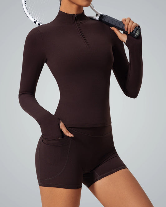 Woman wearing Bandsam SmoothFit Long Sleeve, ideal for stretch, yoga, and workout. Soft, flexible activewear for comfort and style.