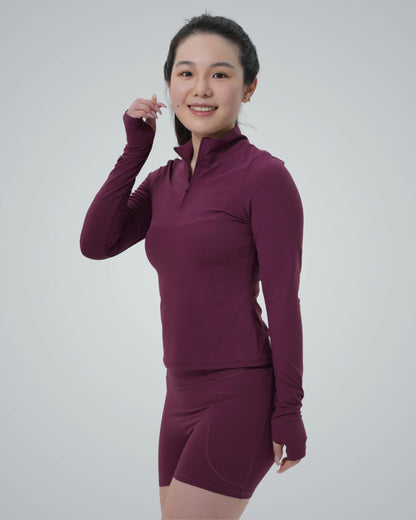 Woman wearing Bandsam SmoothFit Long Sleeve activewear, perfect for yoga and workouts, highlighting comfort and flexibility.