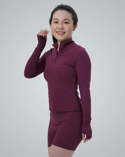 Woman wearing Bandsam SmoothFit Long Sleeve activewear, perfect for yoga and workouts, highlighting comfort and flexibility.
