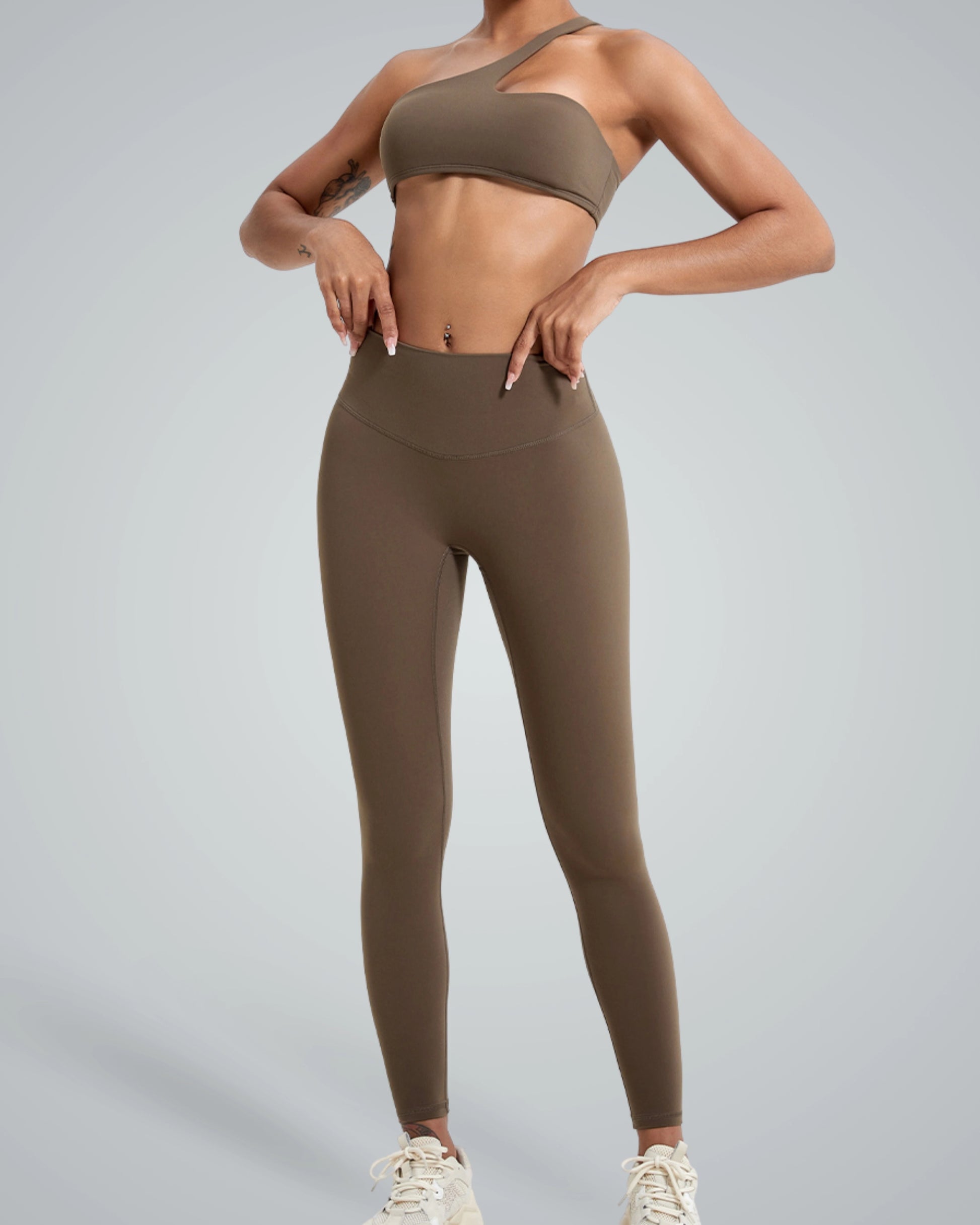 Bandsam ToneTwin Set: Two-piece seamless gym set featuring an asymmetrical top and high-waisted leggings, perfect for yoga and workouts.