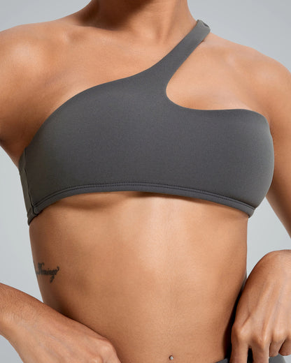 Asymmetrical sports bra from the ToneTwin Set by Bandsam, part of a seamless gym set offering a trendy, minimalist gym look.