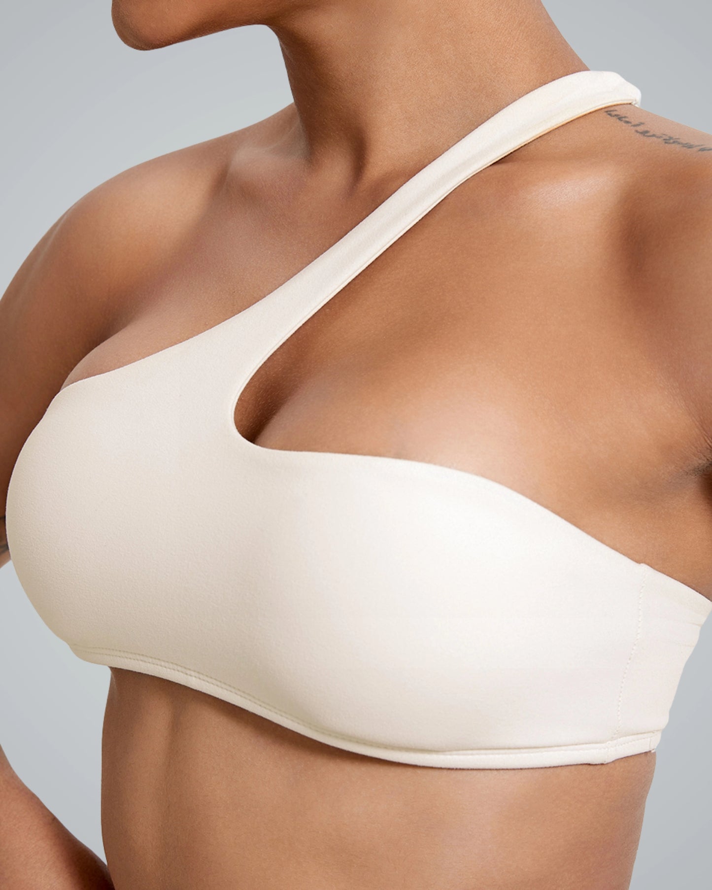 Asymmetrical sports bra from Bandsam ToneTwin Set, offering stylish support and comfort for yoga and workouts.