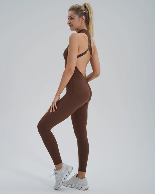 Woman wearing Bandsam VelocityVibe Jumpsuit demonstrating flexible, comfortable activewear for yoga, pilates, or lounging.