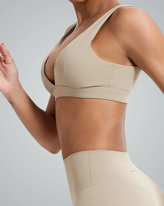 Woman wearing Bandsam Verda Vibe Bralette; soft, flexible activewear for yoga, pilates, or lounging; provides comfort and light support.