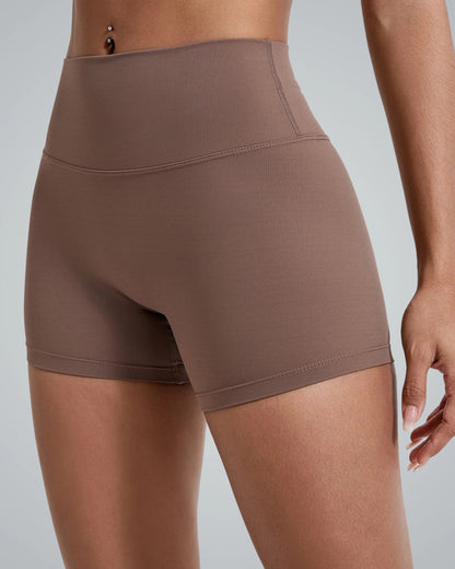 Woman wearing Bandsam VibrantMove Shorts in brown, features include stretch, comfort, activewear for yoga, pilates, lounging.