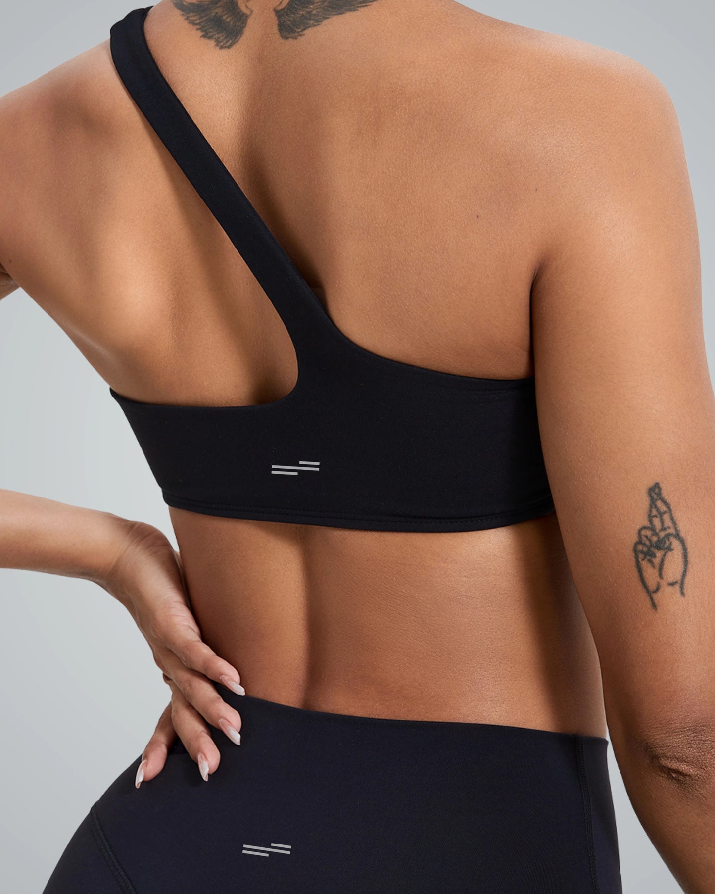 Back view of woman wearing Bandsam Zenith Solo Bra. Perfect for yoga and workout. Soft, stretchy activewear for women focused on comfort.