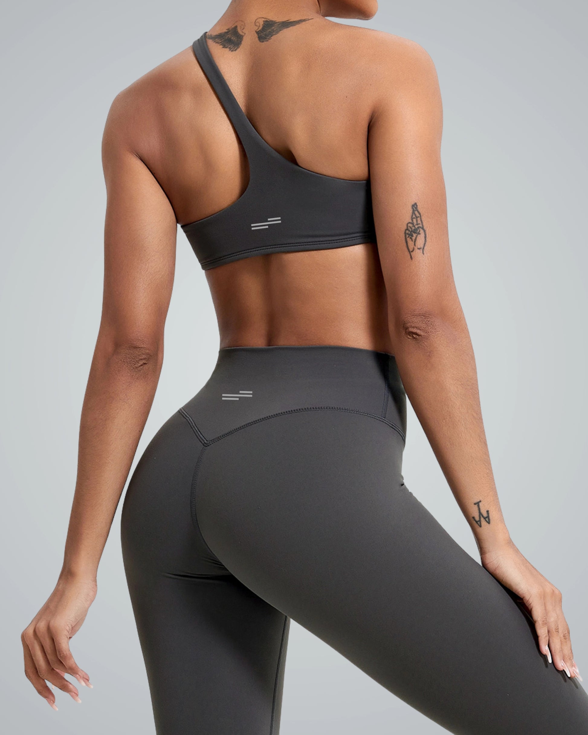Woman wearing Bandsam Zenith Solo Bra, showcasing soft stretch fabric ideal for yoga and workouts, stylish activewear.