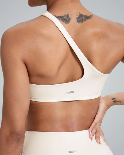 Back view of a woman wearing the Zenith Solo Bra by Bandsam, showcasing its soft stretch material, ideal for yoga and workouts.